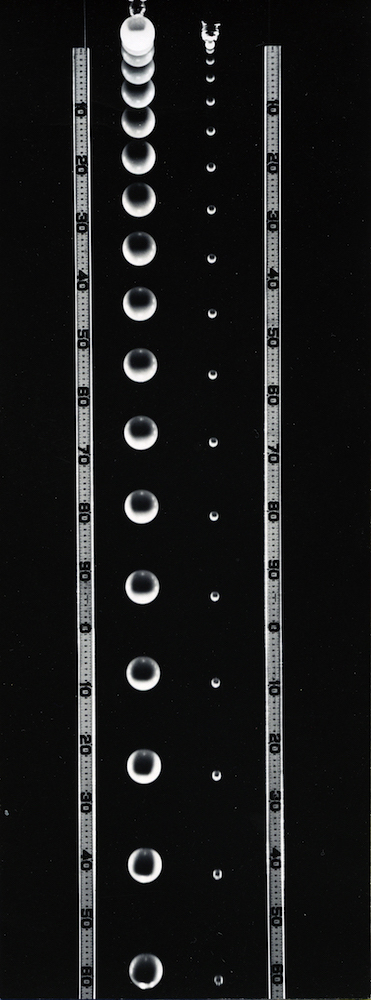 Falling balls of unequal mass, 1958-61