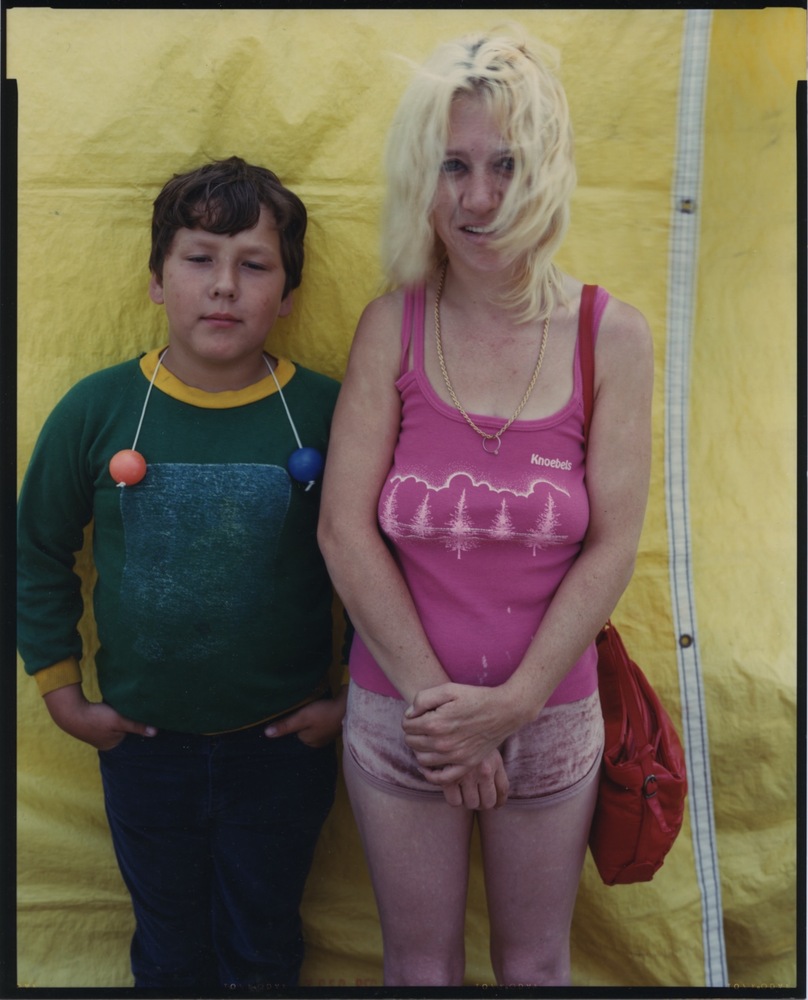 Boy in green, gal in pink, carnival, ca. 1986