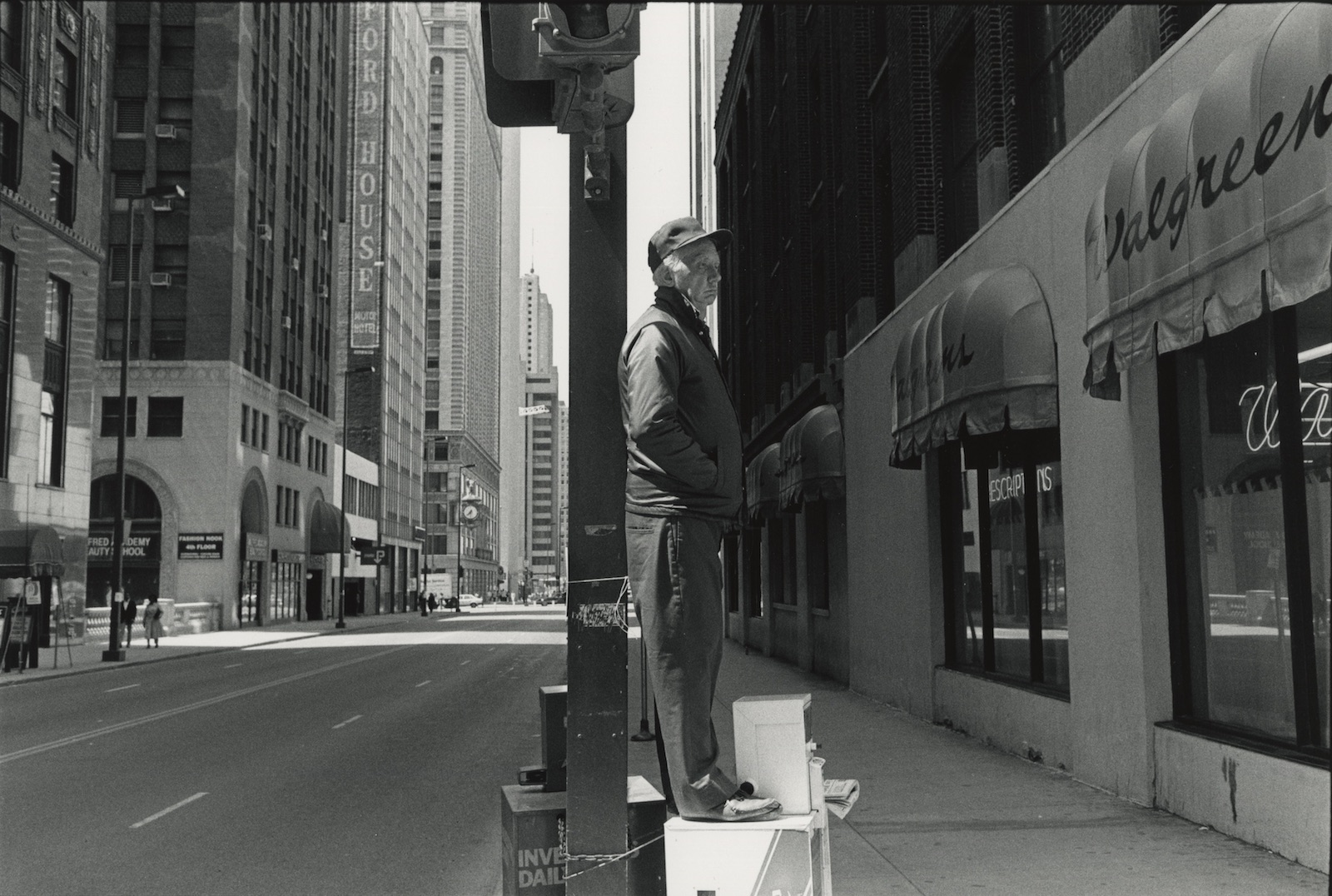 Man on a newspaper stand, Chicago, 1987