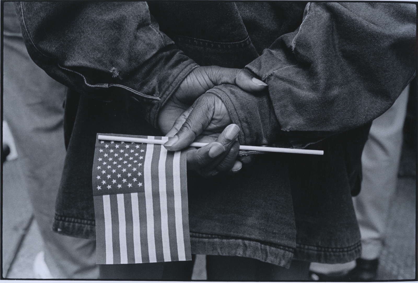 Hands with flag, Chicago, 1990
