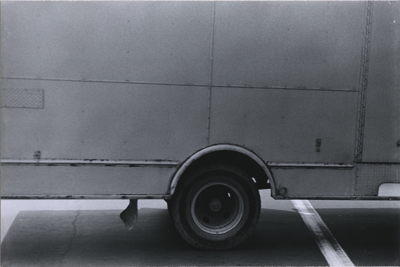 Side of moving truck, Minneapolis, 1970