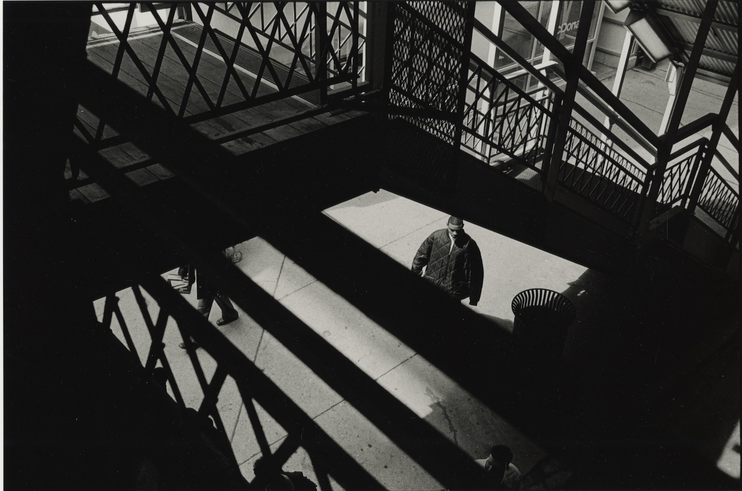 Man in a jacket, Looking down from L platform, Chicago, 2003